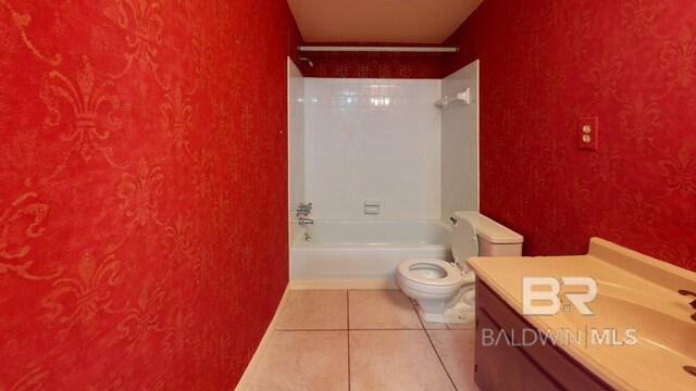 full bathroom with vanity, toilet, tile patterned floors, and tiled shower / bath