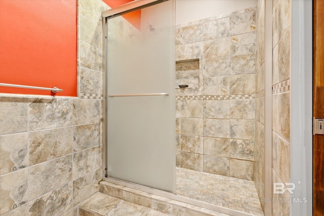 bathroom with an enclosed shower