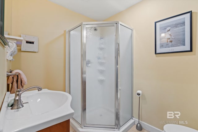 51 N Jackson St Unit A, Mobile, AL 36602 - bathroom featuring a shower stall and vanity
