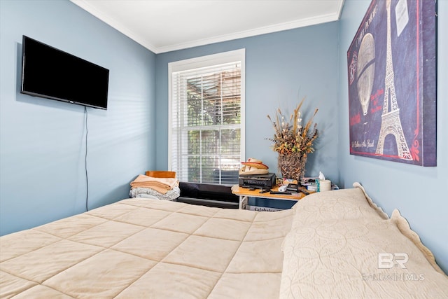 bedroom featuring crown molding