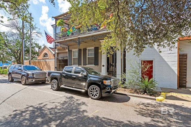 51 N Jackson St Unit A, Mobile, AL 36602 - multi unit property featuring a balcony and uncovered parking