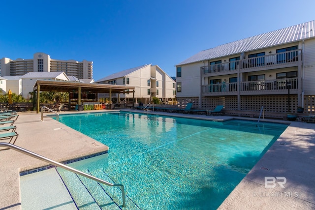 pool with a patio