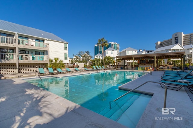 pool featuring a patio area