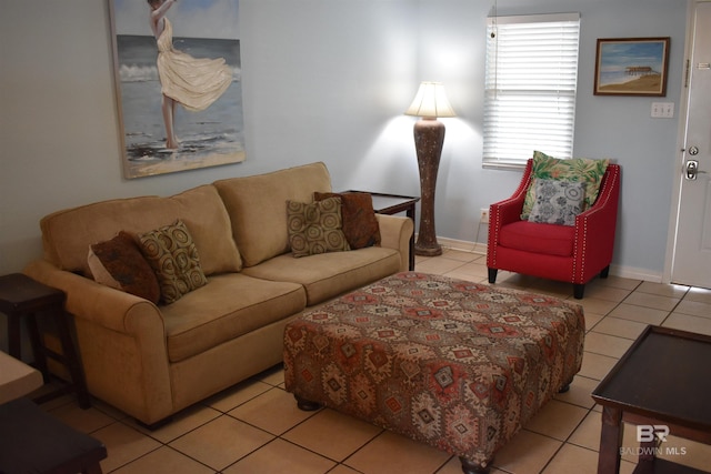 living room with light tile patterned flooring