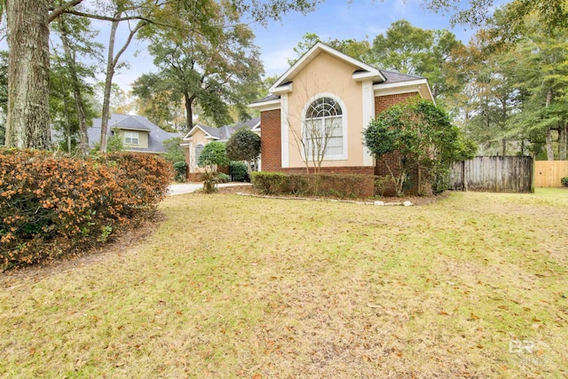 view of home's exterior featuring a yard