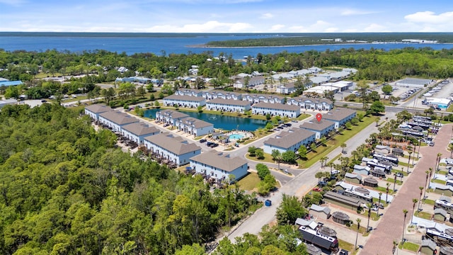 drone / aerial view with a water view