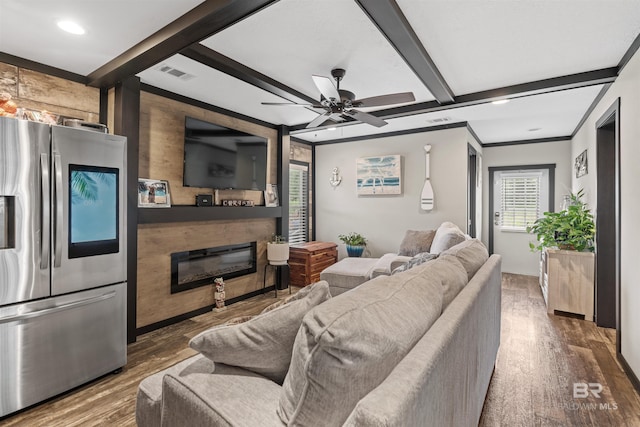 11691 Grantham Rd, Foley, AL 36535 - living area featuring a fireplace, wood finished floors, a ceiling fan, recessed lighting, and beamed ceiling