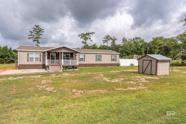 11691 Grantham Rd, Foley, AL 36535 - view of front facade with covered porch and a shed