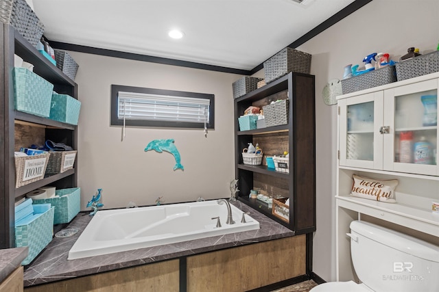 11691 Grantham Rd, Foley, AL 36535 - full bathroom featuring a bath and toilet