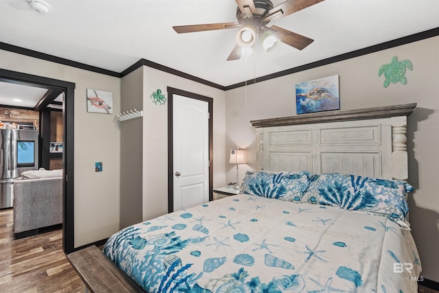 11691 Grantham Rd, Foley, AL 36535 - bedroom with wood finished floors, stainless steel fridge, crown molding, and ceiling fan