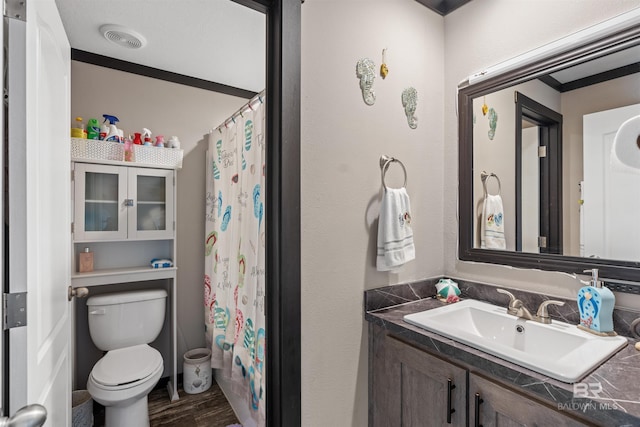 11691 Grantham Rd, Foley, AL 36535 - full bath featuring vanity, wood finished floors, and a shower with shower curtain