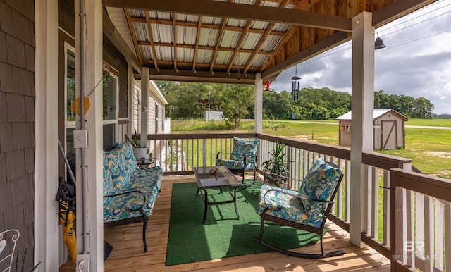 11691 Grantham Rd, Foley, AL 36535 - wooden terrace with a storage shed and a yard