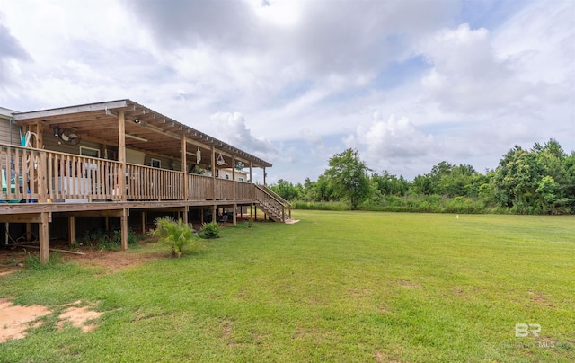 11691 Grantham Rd, Foley, AL 36535 - view of green lawn featuring a deck and stairway