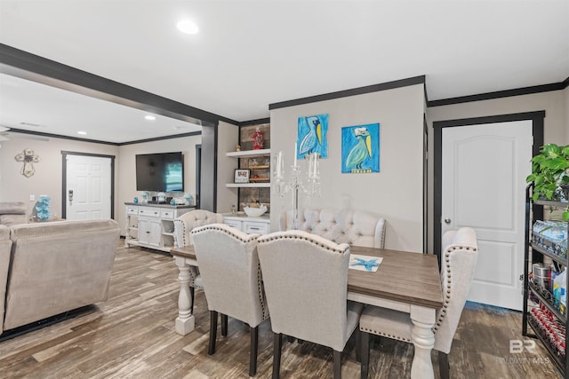 11691 Grantham Rd, Foley, AL 36535 - dining area featuring crown molding, wood finished floors, and recessed lighting
