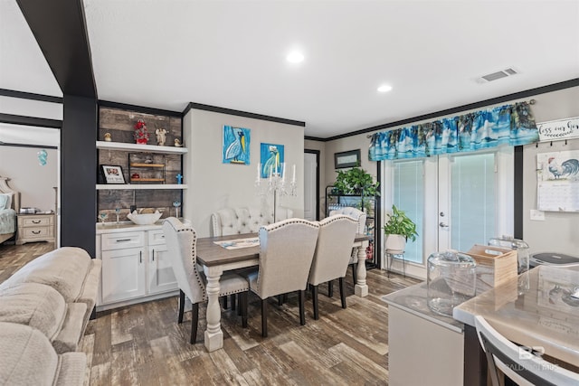 11691 Grantham Rd, Foley, AL 36535 - dining area featuring crown molding, dark wood finished floors, and recessed lighting