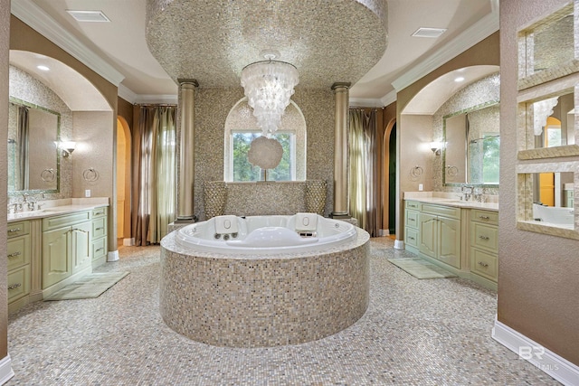 bathroom with baseboards, visible vents, ornamental molding, and two vanities