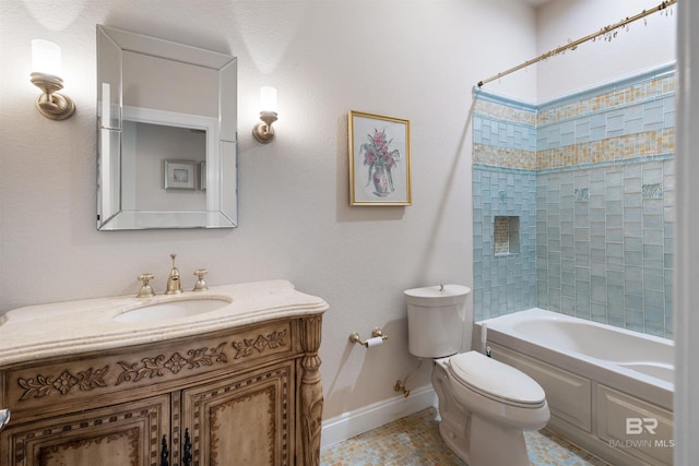 bathroom featuring washtub / shower combination, baseboards, vanity, and toilet