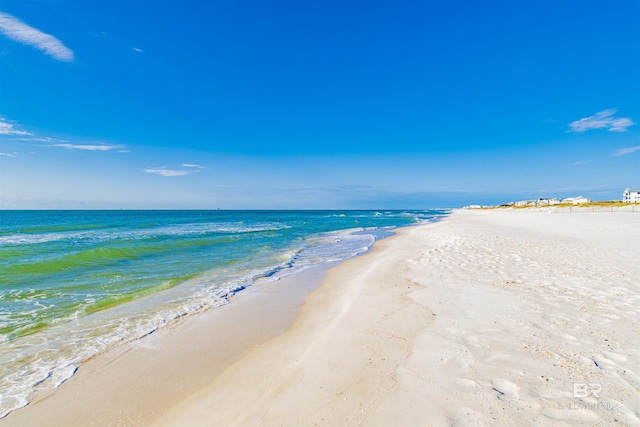 property view of water featuring a beach view