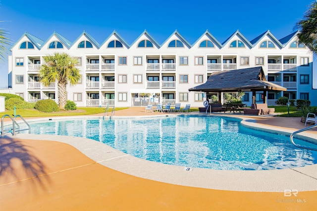 pool featuring a patio area