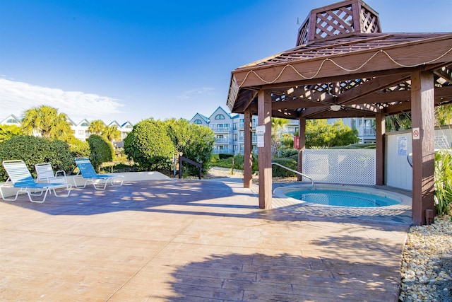 view of swimming pool featuring a gazebo, a patio area, and a pool