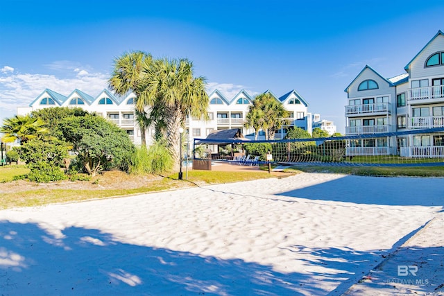 surrounding community featuring volleyball court