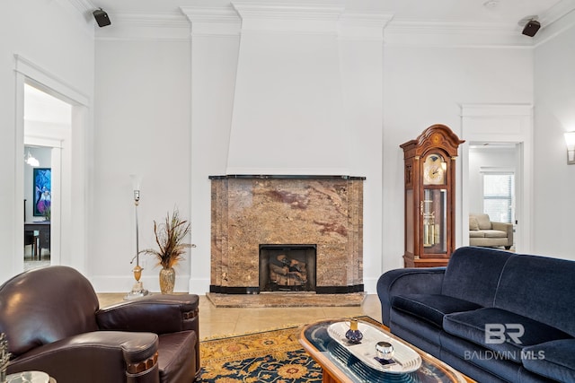 living room featuring ornamental molding and a fireplace