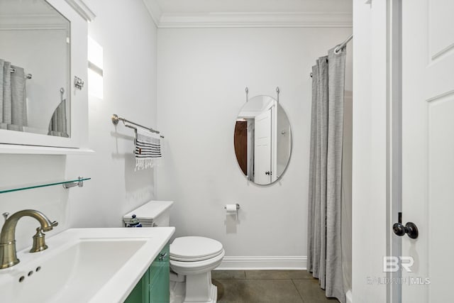 bathroom with vanity, tile patterned floors, ornamental molding, and toilet