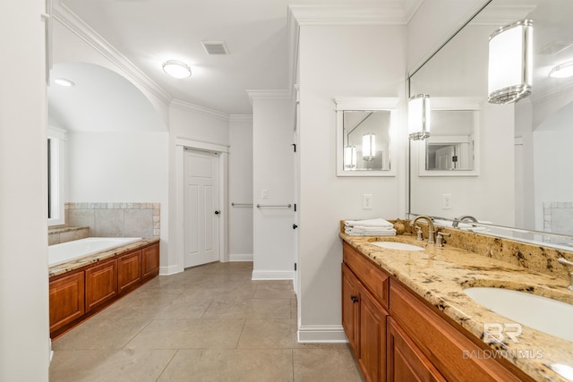 bathroom with vanity, ornamental molding, a tub to relax in, and tile patterned floors