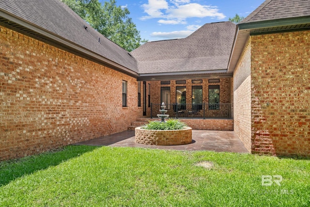 exterior space with french doors and a patio area