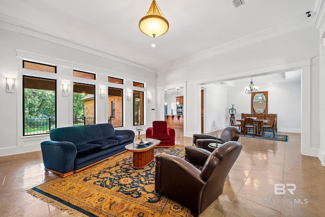 living room featuring an inviting chandelier and crown molding