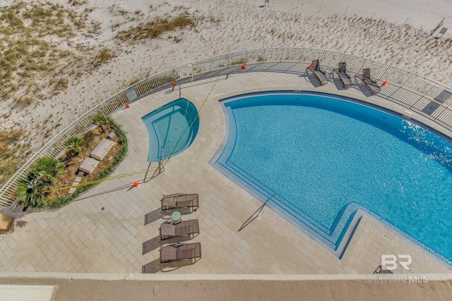 view of pool with a patio