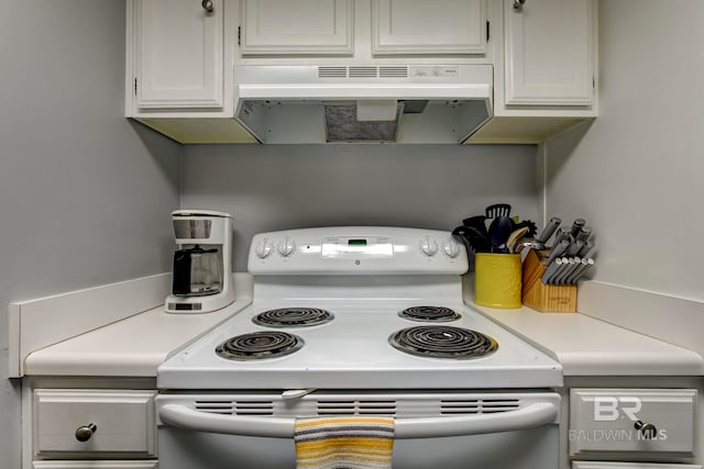 kitchen with range hood, white cabinetry, and white range with electric stovetop