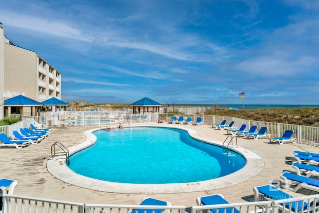 view of swimming pool featuring a patio