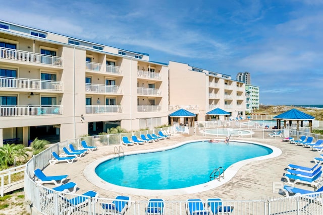 view of swimming pool featuring a patio area