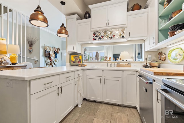 kitchen featuring white cabinetry, light countertops, stainless steel dishwasher, open shelves, and pendant lighting