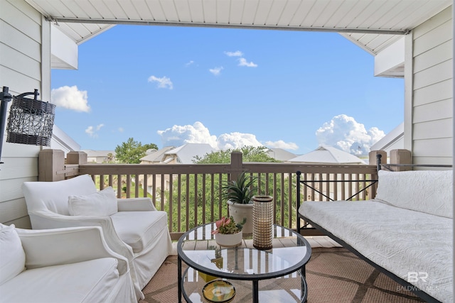 balcony with an outdoor hangout area