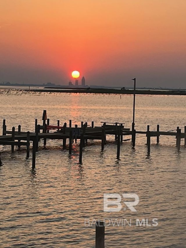 view of dock featuring a water view