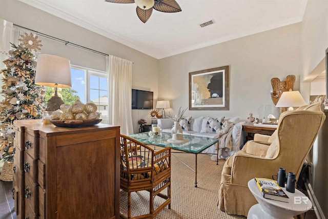 office with ceiling fan, visible vents, and crown molding