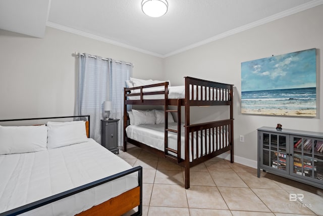 1524 W Beach Blvd Unit 506, Gulf Shores, AL 36542 - bedroom featuring crown molding and tile patterned flooring