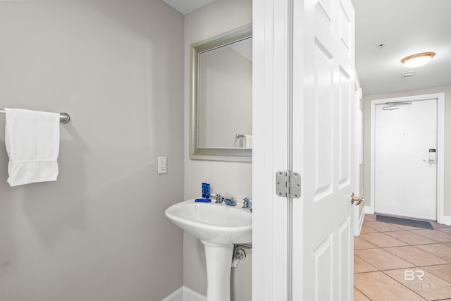1524 W Beach Blvd Unit 506, Gulf Shores, AL 36542 - bathroom with tile patterned floors and sink