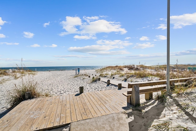 1524 W Beach Blvd Unit 506, Gulf Shores, AL 36542 - view of dock featuring a water view and a beach view