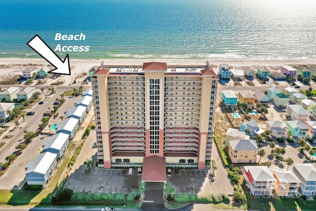 1524 W Beach Blvd Unit 506, Gulf Shores, AL 36542 - drone / aerial view with a beach view and a water view