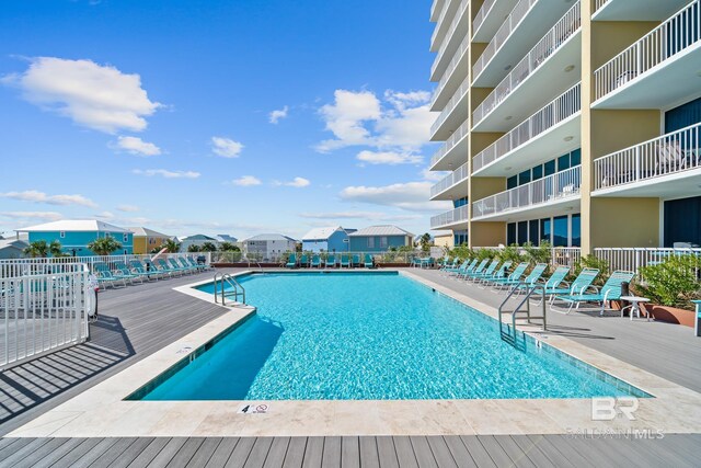 1524 W Beach Blvd Unit 506, Gulf Shores, AL 36542 - view of swimming pool featuring a patio