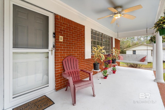 view of patio / terrace with covered porch and ceiling fan