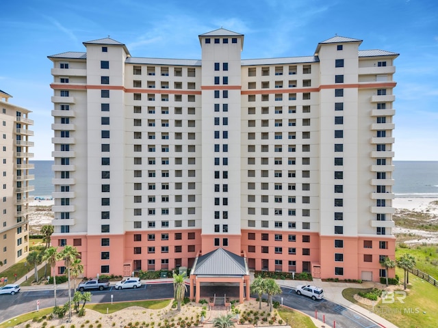 view of building exterior featuring a water view