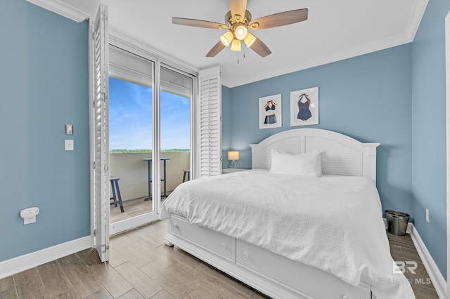 bedroom with access to exterior, baseboards, wood finished floors, and a ceiling fan