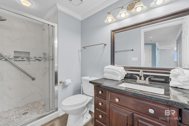 full bathroom with a marble finish shower, wood finished floors, toilet, vanity, and crown molding