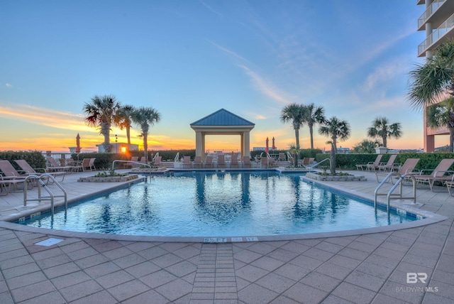 community pool featuring a patio area and a gazebo