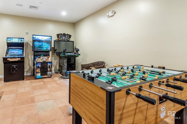 game room with baseboards