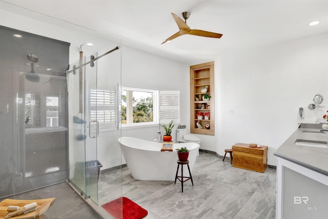 full bathroom with recessed lighting, a soaking tub, ceiling fan, a shower stall, and vanity